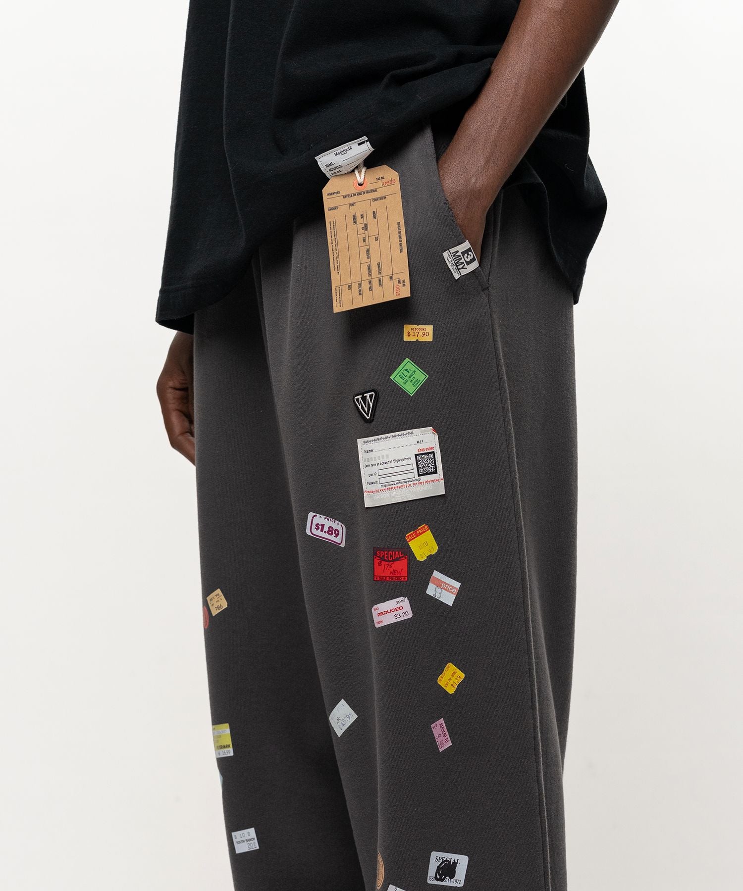 【9/2(水)発売】Price Tag Sticker Printed Sweat Pants