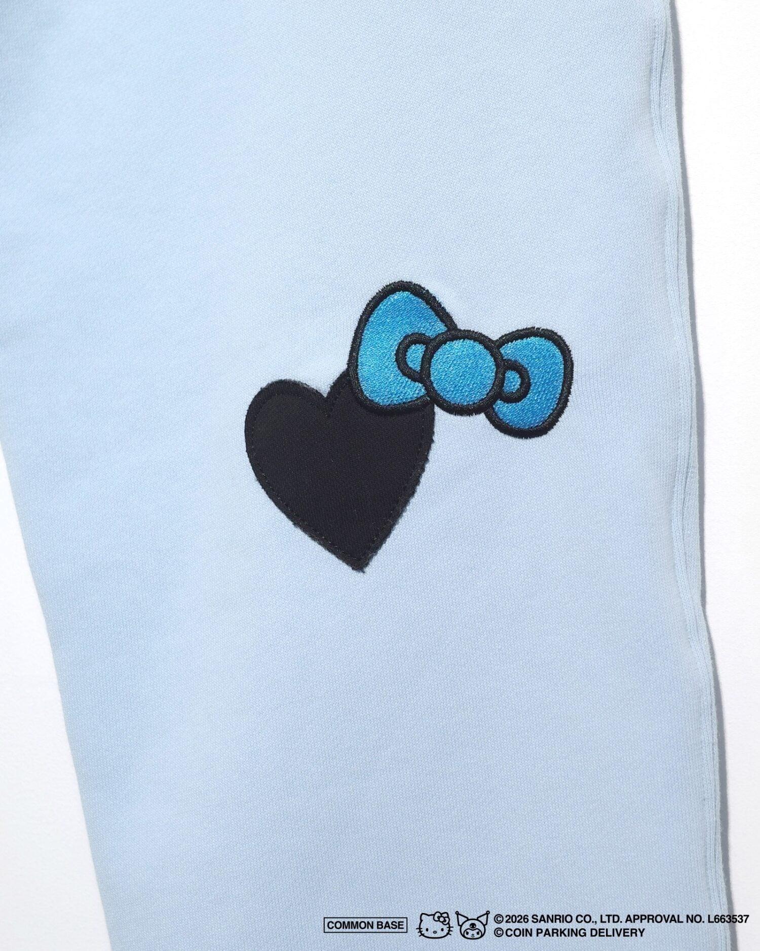 COIN PARKING DELIVERY × SANRIO CHARACTERS PACTHWORK SWEAT PANTS