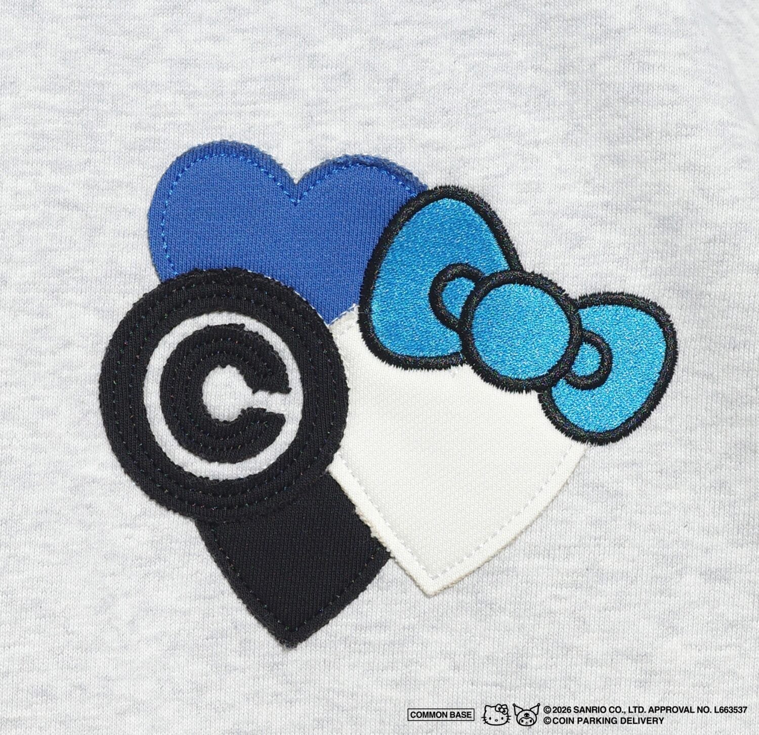 COIN PARKING DELIVERY × SANRIO CHARACTERS PACTHWORK SWEATSHIRT
