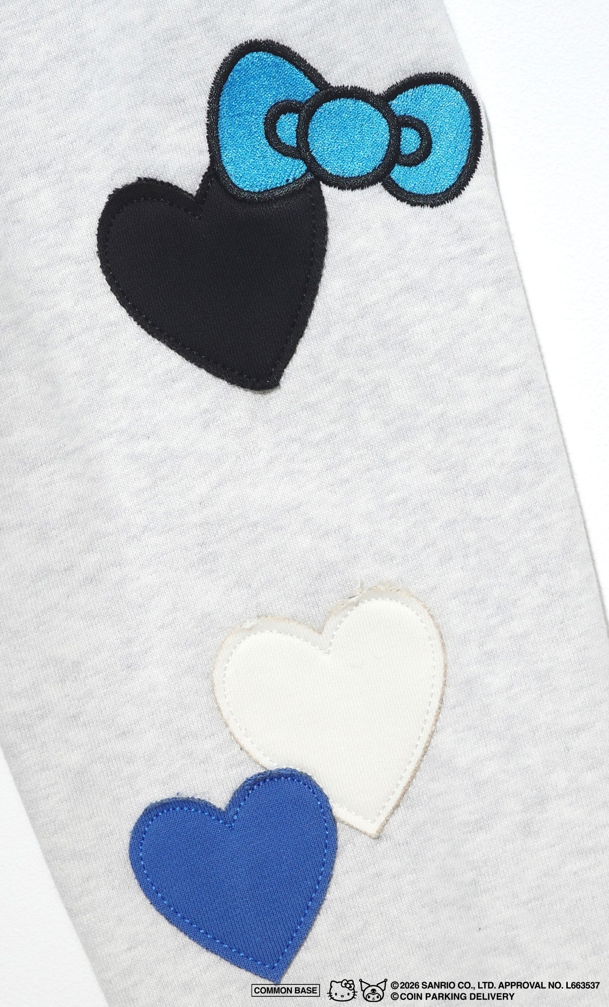 COIN PARKING DELIVERY × SANRIO CHARACTERS PACTHWORK SWEATSHIRT