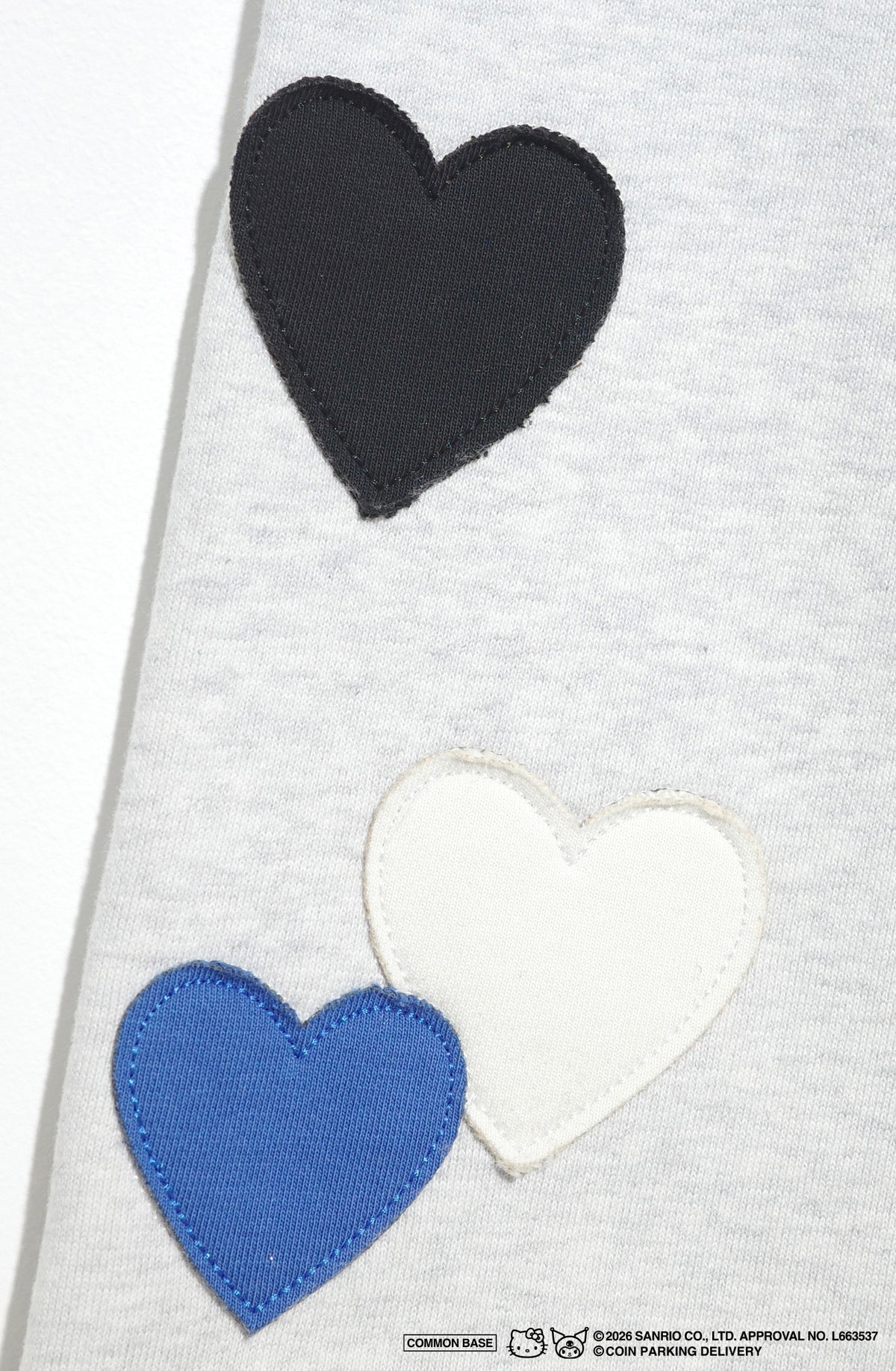 COIN PARKING DELIVERY × SANRIO CHARACTERS PACTHWORK SWEATSHIRT