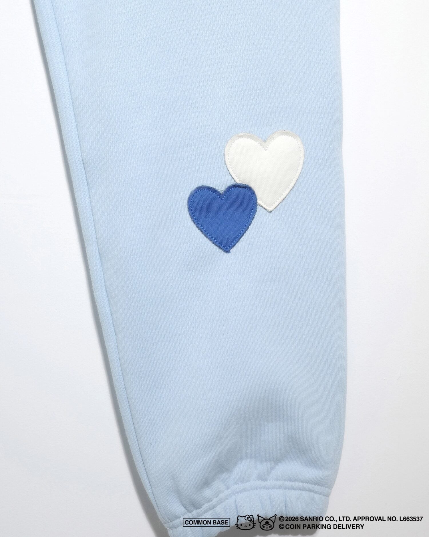 COIN PARKING DELIVERY × SANRIO CHARACTERS PACTHWORK SWEAT PANTS