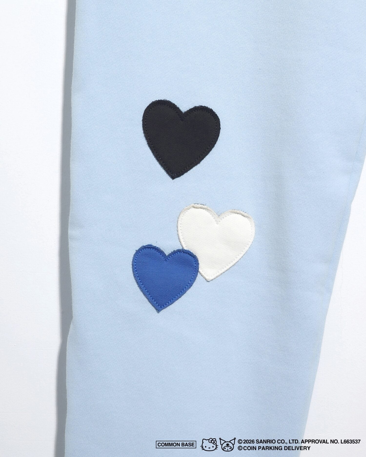 COIN PARKING DELIVERY × SANRIO CHARACTERS PACTHWORK SWEAT PANTS